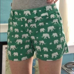 Green shorts with white elephant print